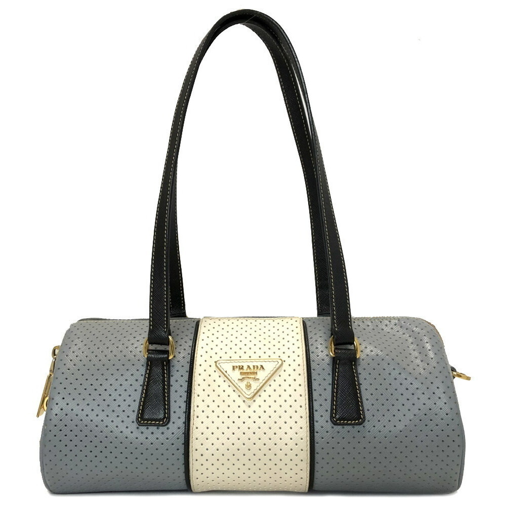Prada Triangular Light Cylindrical Punching Handb… - image 1